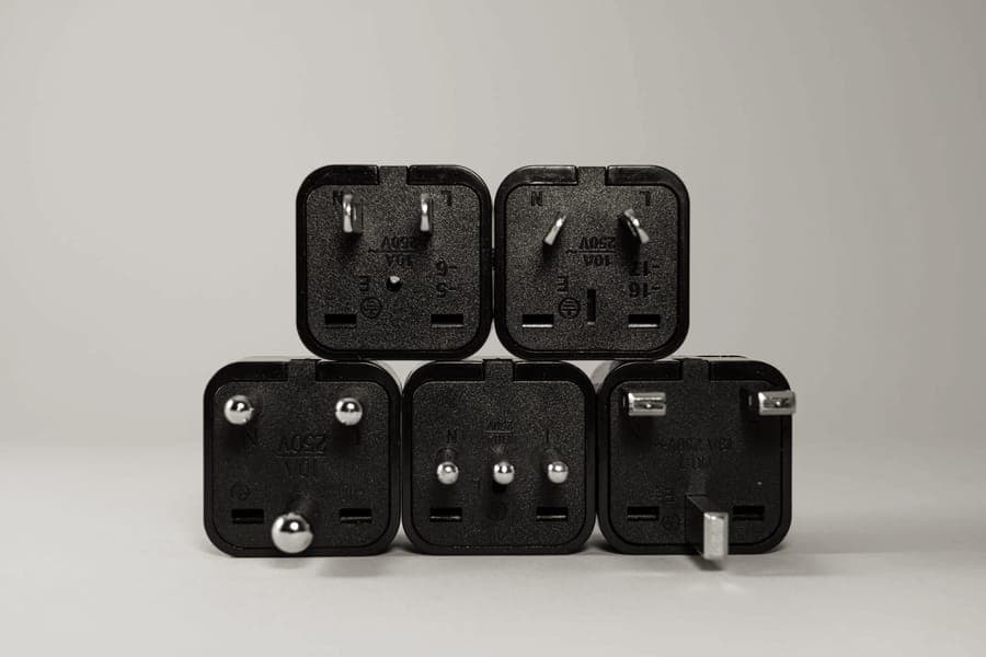 A universal travel plug adapter with USB ports
