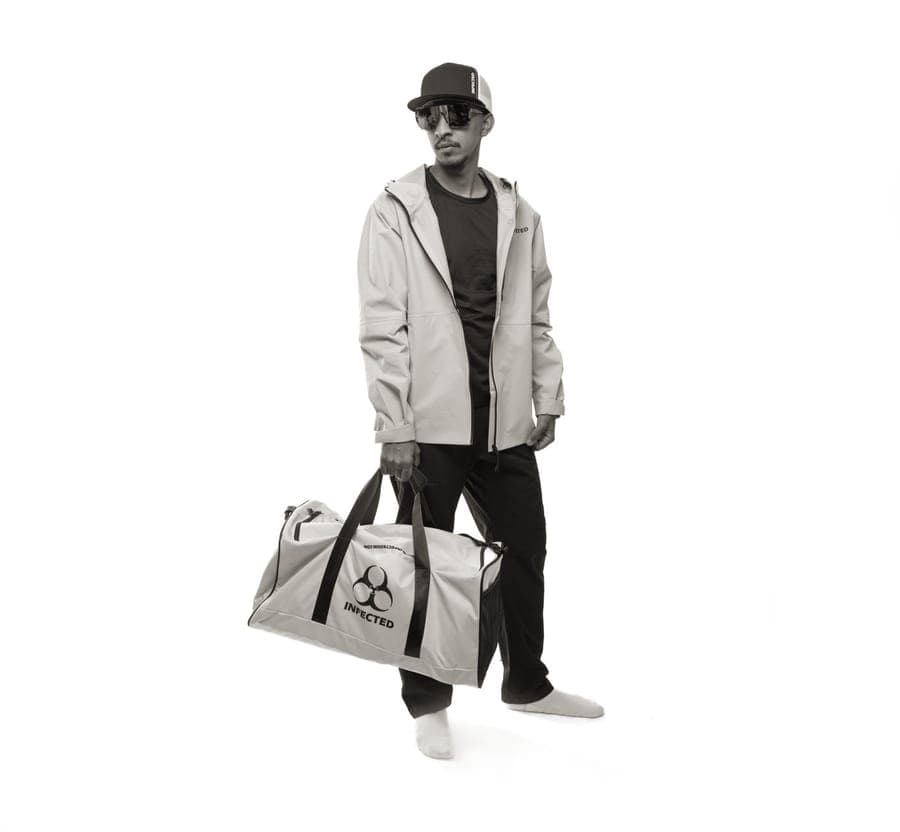 A large coated fabric travel duffel bag