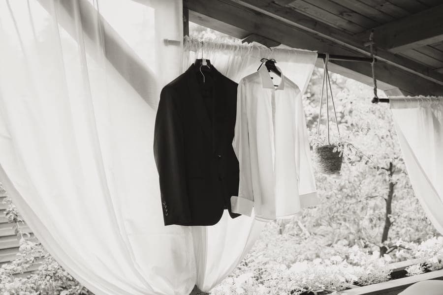 A suit hanging in a travel garment bag