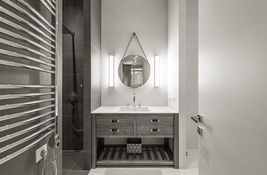 A hanging makeup organizer with small pockets