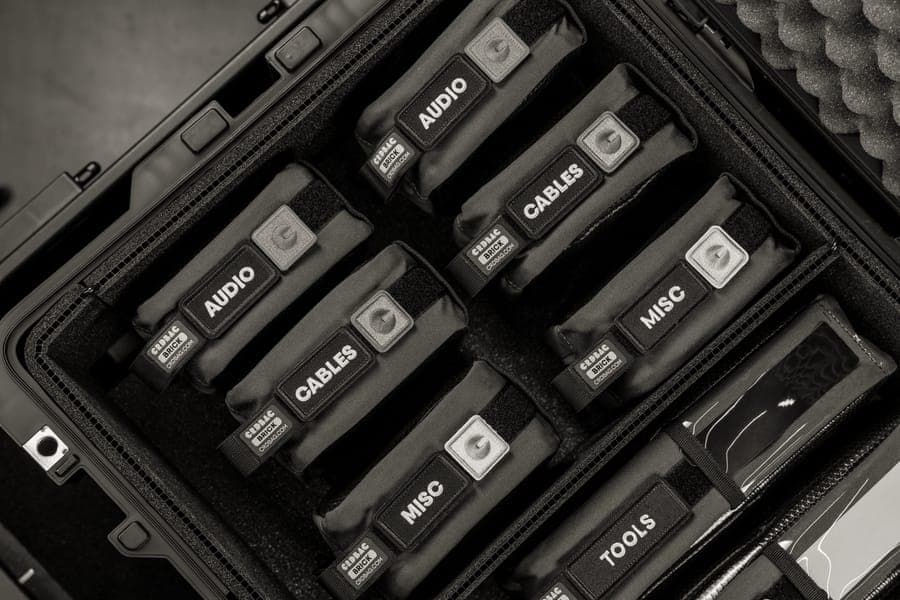 Cables and chargers arranged in a travel electronics organizer