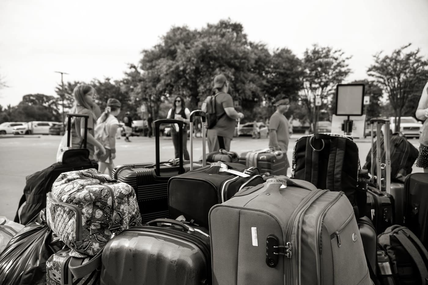 Several matching suitcases lined up ready for a trip