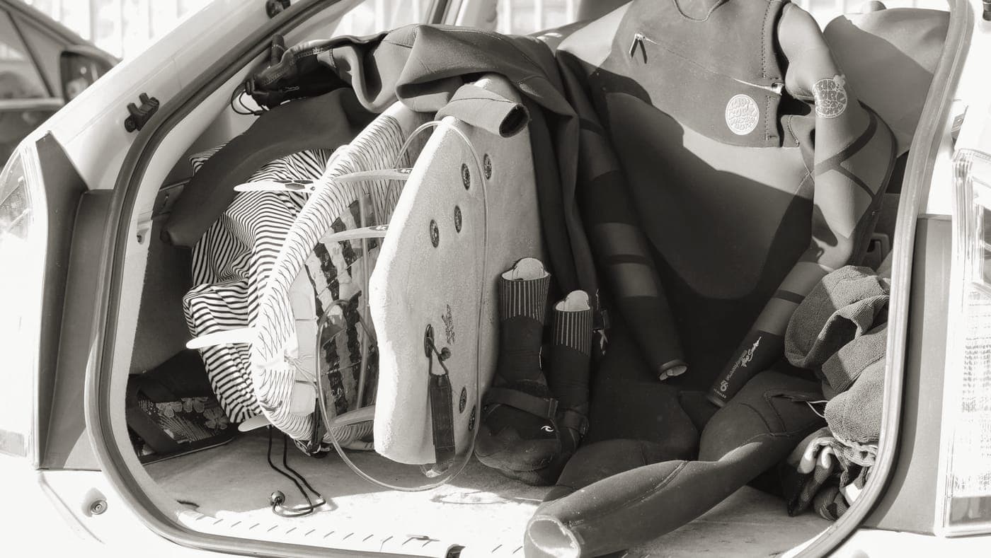 Bags loaded into the back of a car before a road trip