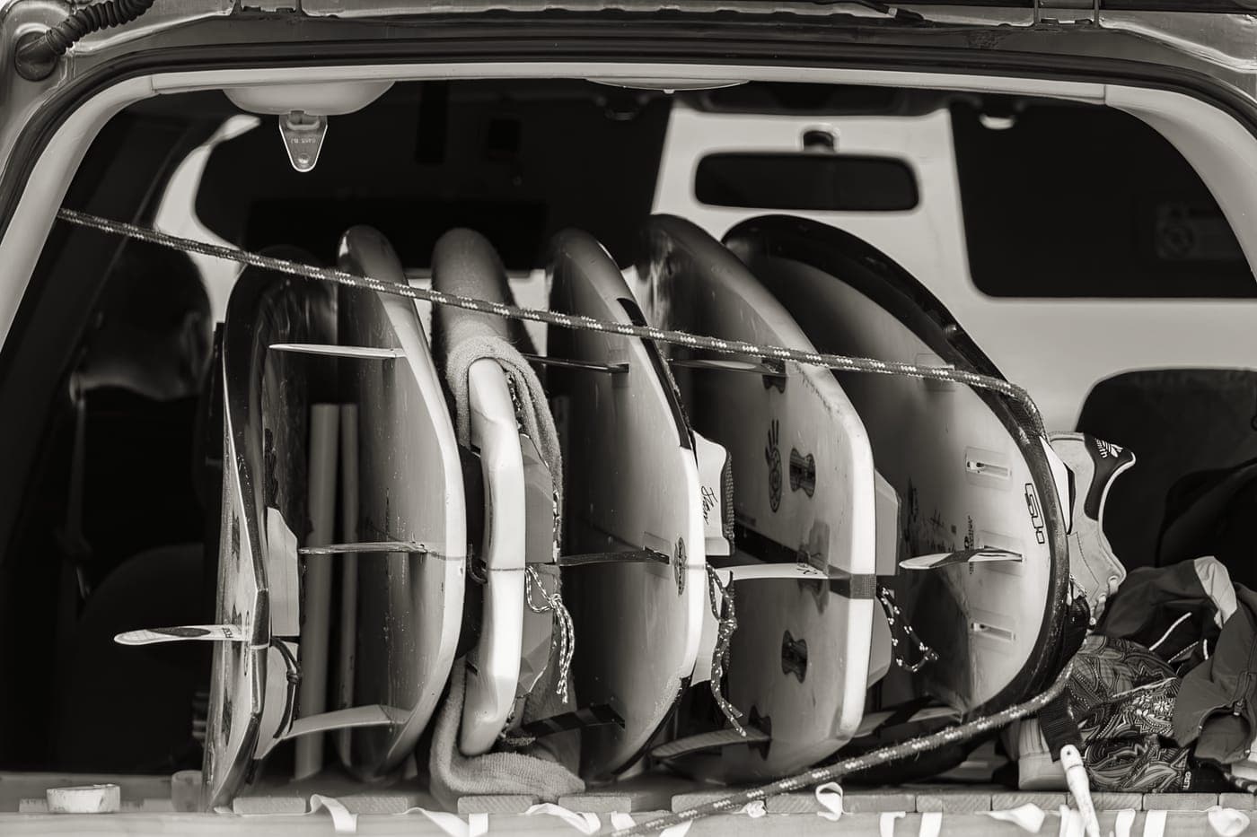 Bags loaded into the back of a car at a roadside stop